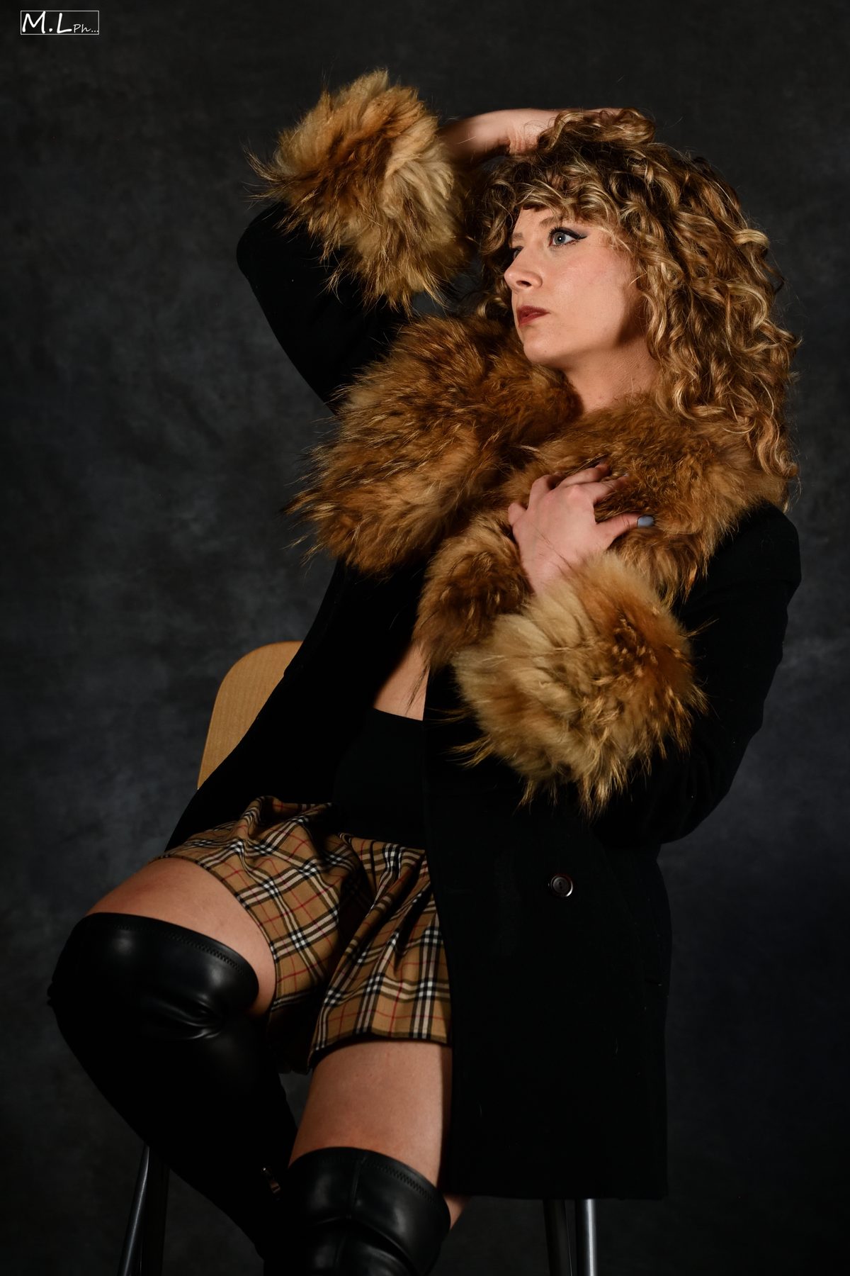 Pelliccia e stivali, studio